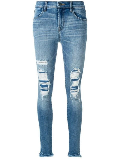 Shop J Brand Distressed Skinny Jeans In Blue