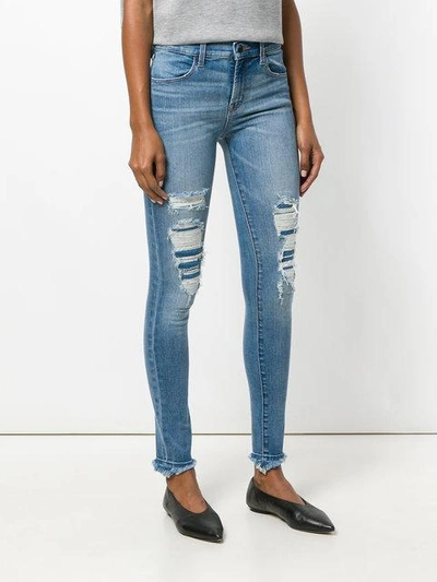 Shop J Brand Distressed Skinny Jeans In Blue