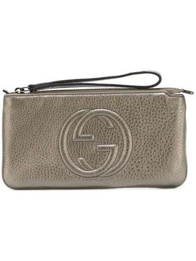 Shop Gucci Gg Embossed Pouch