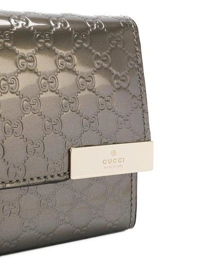 Shop Gucci Signature Chain Wallet