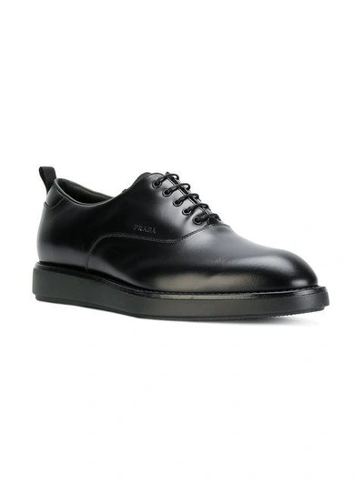 Shop Prada Rubber Sole Oxford Shoes In Black