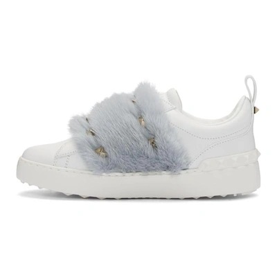 Shop Valentino White And Blue  Garavani Fur Laceless Rockstud Sneakers In 39a Light Blue