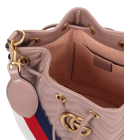 Shop Gucci Gg Marmont Leather Bucket Bag In Beige
