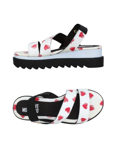 Shop Love Moschino Sandals In White