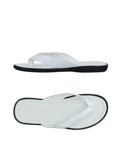 Shop Doucal's Flip Flops In White