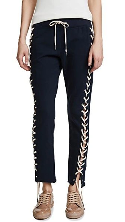 Shop Pam & Gela Cropped Lace Up Sweatpants In Neat Navy