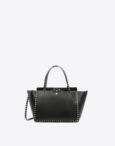 Shop Valentino Garavani Medium Rockstud Bag In Black