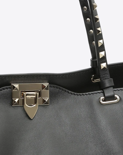 Shop Valentino Garavani Medium Rockstud Bag In Black