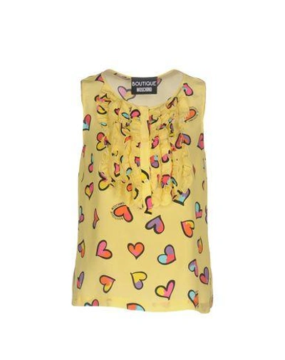 Shop Boutique Moschino Tops In Yellow