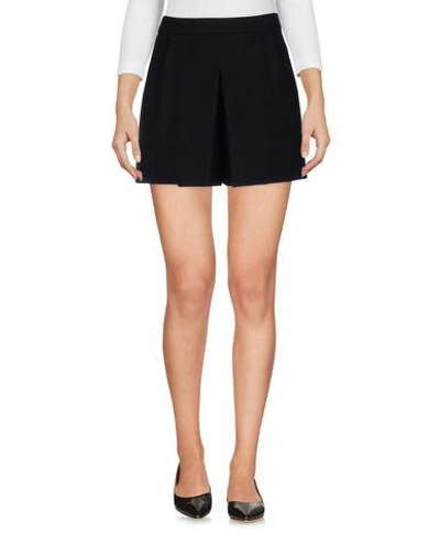 Shop Boutique Moschino Shorts & Bermuda In Black