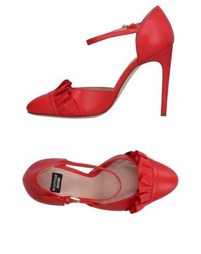 Shop Boutique Moschino Pumps In Red