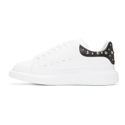 Shop Alexander Mcqueen White And Black Studded Oversized Sneakers In 9061whtblk