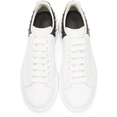 Shop Alexander Mcqueen White And Black Studded Oversized Sneakers In 9061whtblk