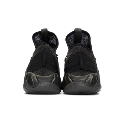 Shop Adidas Originals Black Tubular Rise Sneakers In Coer Blk/ Core Red S