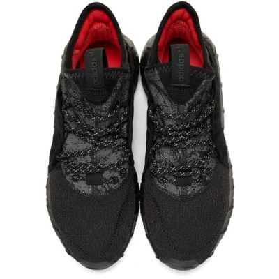 Shop Adidas Originals Black Tubular Rise Sneakers In Coer Blk/ Core Red S