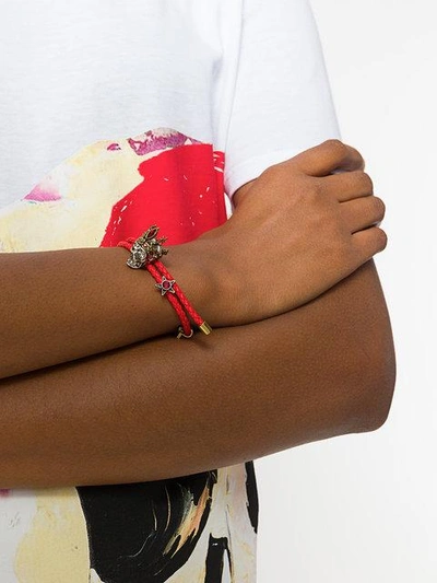 Shop Alexander Mcqueen Woven Skull Friendship Bracelet In Red