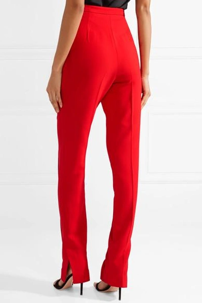 Shop Khaite Diana Stretch-canvas Tapered Pants In Red