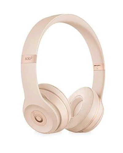 Shop Beats By Dr. Dre Solo 3 Wireless Headphones In Matte Gold