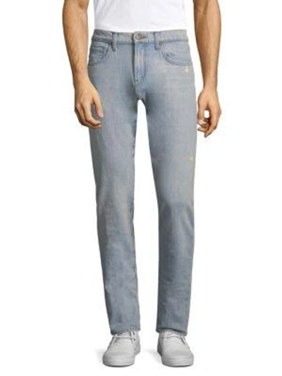 Shop J Brand Tyler Tapered Slim-fit Jeans In Intertidal