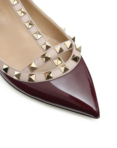 Shop Valentino Rockstud Patent Ballerina Cage Flat In Maroon