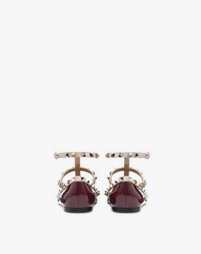 Shop Valentino Rockstud Patent Ballerina Cage Flat In Maroon