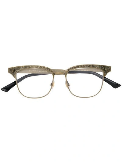 Shop Gucci Eyewear Engraved Round Glasses - Metallic