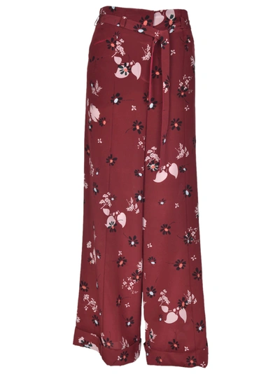 Shop Valentino Floral Print Palazzo Trousers In Rosso