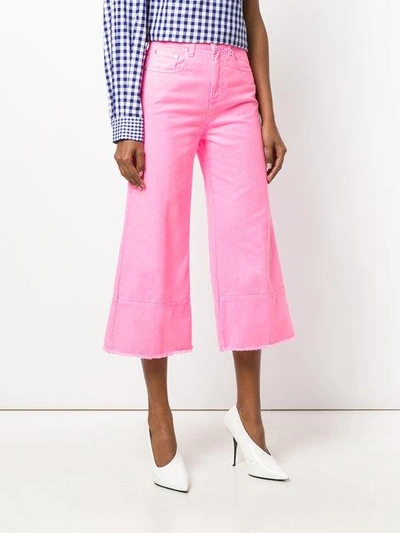 Shop Msgm Cropped Flare Jeans - Pink