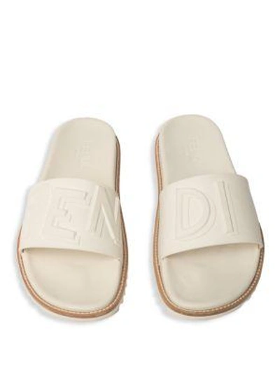 Shop Fendi Logo Embossed Slide Sandals In Blue Denim