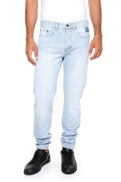 Shop Saint Laurent Denim Jeans With Embroidered Logo In Light Blueblu