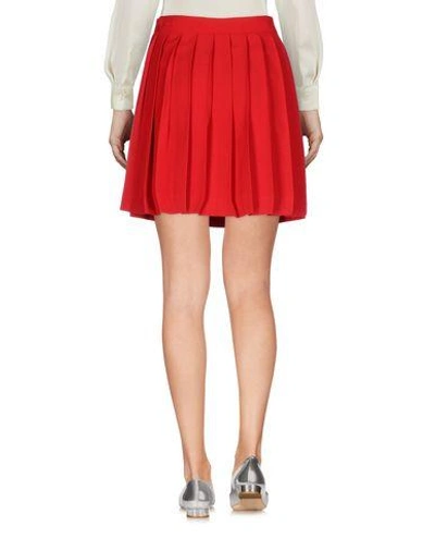Shop Au Jour Le Jour Mini Skirt In Red