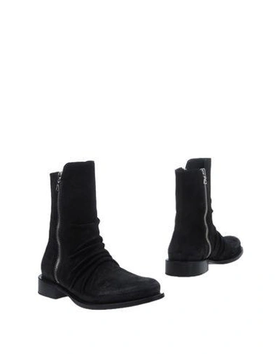 Shop Amiri Ankle Boots In Black