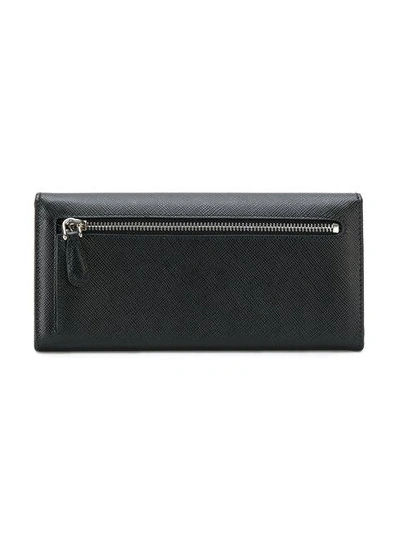 Shop Prada Saffiano Continental Wallet - Black