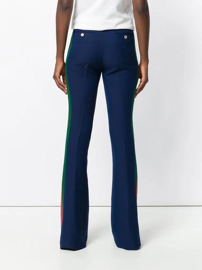 Shop Gucci High Waisted Flared Trousers - Blue