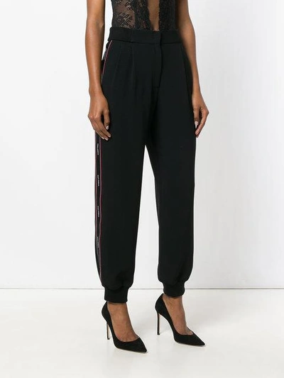 Shop Dolce & Gabbana Logo Piped Trousers - Black