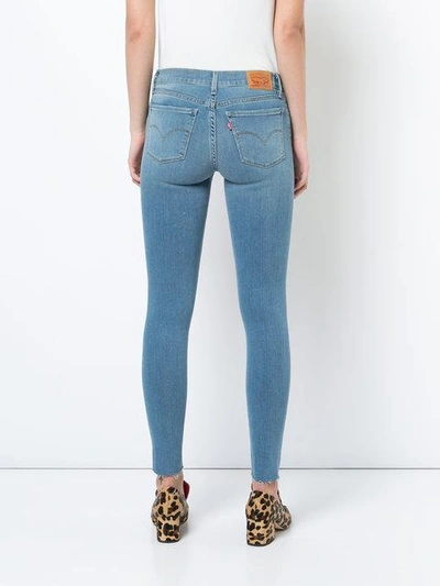 Shop Levi's 710 Super Skinny Jeans - Blue