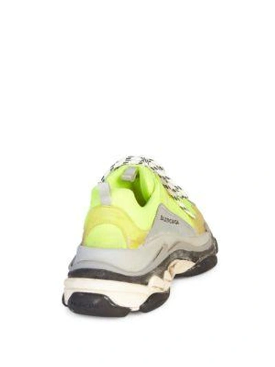 Shop Balenciaga Triple S Runner Trainers In Yellow