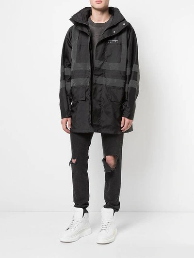 Shop Yeezy Constructions Parka Coat In Black