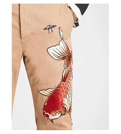 Shop Gucci Fish-embroidered Straight Cropped Cotton Trousers In Beige