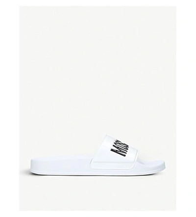 Shop Moschino Logo Rubber Pool Sliders In White/blk