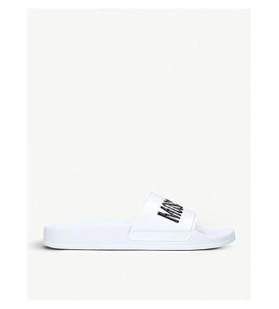 Moschino Embossed Logo Pool Slides In White/blk