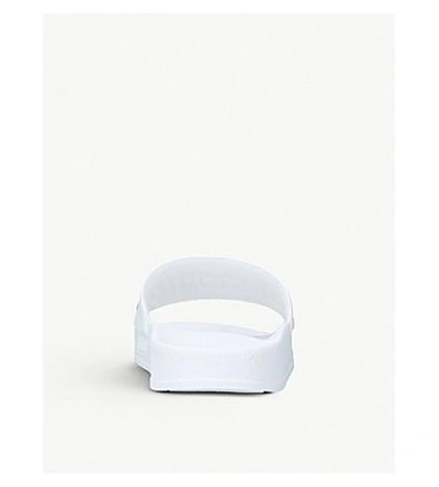 Moschino Embossed Logo Pool Slides In White/blk