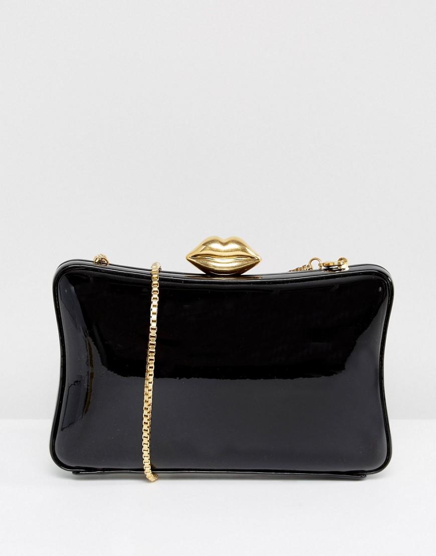 gold patent clutch bag