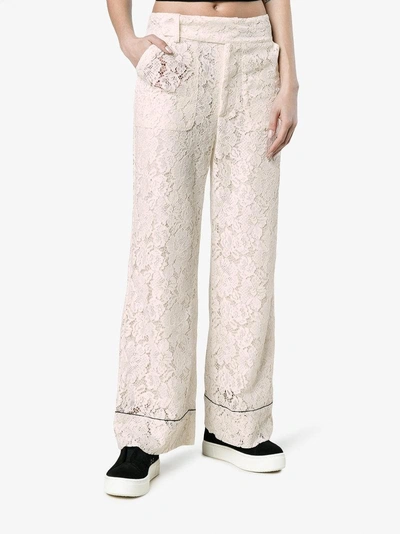Shop Ganni Jerome Wide-leg Lace Trousers In White