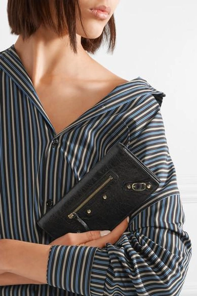 Shop Balenciaga Textured-leather Wallet In Black