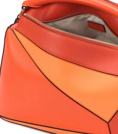 Shop Loewe Puzzle Leather Shoulder Bag In Orange