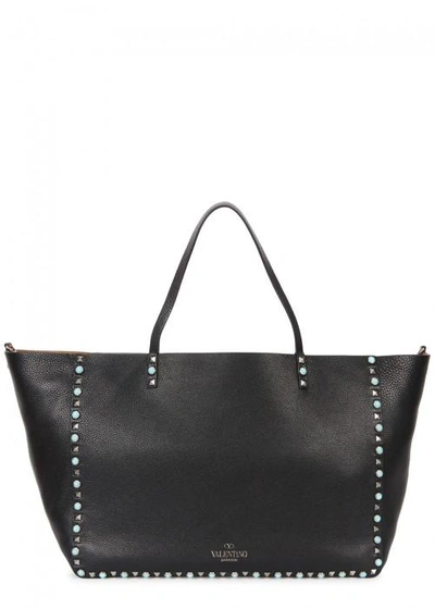 Shop Valentino Rockstud Rolling Reversible Leather Tote In Black