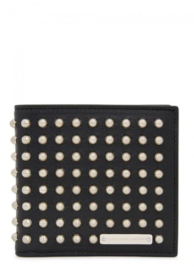 Shop Alexander Mcqueen Studded Leather Wallet In Black