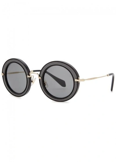 Shop Miu Miu Black Round-frame Sunglasses