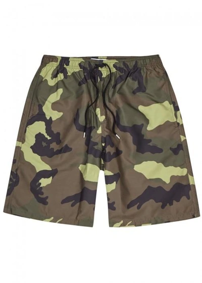 Shop Givenchy Camouflage Swim Shorts In Green